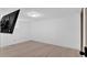 Basement room offers a clean, minimalist canvas with light laminate flooring and ample wall space at 2210 Polar Rock Sw Ave, Atlanta, GA 30315