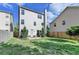 Spacious backyard with a wood fence and green grass at 3128 Onamia Rd, Duluth, GA 30096