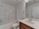 Bathroom features modern fixtures, a large vanity, and combined shower and bathtub at 3128 Onamia Rd, Duluth, GA 30096