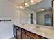 Bathroom features double sink vanity and a large mirror at 3128 Onamia Rd, Duluth, GA 30096