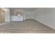 Bright living room features modern hard surface flooring and plenty of natural light at 3128 Onamia Rd, Duluth, GA 30096