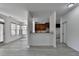 Open concept living room and dining area with wood floors and natural light at 3128 Onamia Rd, Duluth, GA 30096