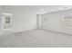 This bonus room offers natural light through its double hung windows and ample space for relaxation or entertainment at 6905 Winchester Pl, Fairburn, GA 30213