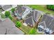 An aerial view of a home with a green backyard, surrounded by neighboring houses at 919 Olmsted Ln, Johns Creek, GA 30097