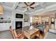 Spacious living room with hardwood floors and a direct view into the open concept kitchen at 919 Olmsted Ln, Johns Creek, GA 30097