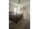 Relaxing bedroom with neutral colors, plush carpet, and natural light at 144 Wiley Dr, Douglasville, GA 30134