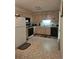 Functional kitchen features white appliances, light wood cabinets, and ample counter space at 144 Wiley Dr, Douglasville, GA 30134