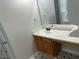 Bathroom featuring a single sink vanity with storage and a large mirror at 3702 Gray Birch Dr, Decatur, GA 30034