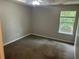 Bedroom with neutral paint, carpet, a window, and natural light at 3702 Gray Birch Dr, Decatur, GA 30034