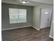 Cozy living room with hardwood floors, a large window, neutral paint, and bright natural light at 3702 Gray Birch Dr, Decatur, GA 30034