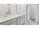 The bathroom features a double sink vanity and a shower at 6908 Winchester Pl, Fairburn, GA 30213