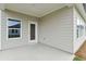 Covered back porch with views of the backyard at 7760 Sheffield Ter, Fairburn, GA 30213