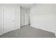 Spacious bedroom featuring neutral walls and plush gray carpeting at 7760 Sheffield Ter, Fairburn, GA 30213