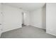 Unfurnished bedroom with neutral walls and soft gray carpeting at 7760 Sheffield Ter, Fairburn, GA 30213
