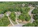 Enjoy privacy and seclusion on this expansive wooded property located in a serene neighborhood at 132 Copper Hills Dr, Canton, GA 30114