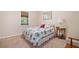 Simple bedroom with a single bed, side table, lamp, and window with blinds at 132 Copper Hills Dr, Canton, GA 30114