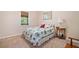 Cozy bedroom with a single bed, window view, and a small side table with a lamp at 132 Copper Hills Dr, Canton, GA 30114