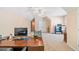Office featuring a large desk, computer, and plenty of natural light at 132 Copper Hills Dr, Canton, GA 30114
