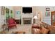 Cozy living room with a stone fireplace, plush furniture, and a flatscreen TV above the mantle at 132 Copper Hills Dr, Canton, GA 30114