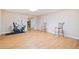 Room with hardwood floors, neutral walls, an elliptical machine, and seating at 132 Copper Hills Dr, Canton, GA 30114
