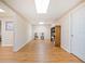 Spacious room with hardwood floors, neutral walls, and recessed lighting at 132 Copper Hills Dr, Canton, GA 30114