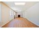 Spacious room featuring hardwood floors, neutral walls, and fireplace at 132 Copper Hills Dr, Canton, GA 30114