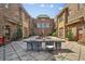 Inviting courtyard featuring stone seating area, lush landscaping, and a central fountain, perfect for gatherings at 1832 Gordon Ne Mnr, Atlanta, GA 30307