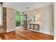 Inviting foyer features hardwood floors, a modern console table, and an arched doorway at 1832 Gordon Ne Mnr, Atlanta, GA 30307