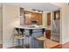 Well-equipped kitchen features a breakfast bar, stainless steel appliances, and ample cabinetry at 1832 Gordon Ne Mnr, Atlanta, GA 30307