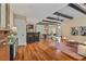 Spacious living room boasting hardwood floors, exposed beams, and an open floor plan at 1832 Gordon Ne Mnr, Atlanta, GA 30307