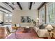 Bright living room showcases hardwood floors, exposed brick accents, and stylish decor at 1832 Gordon Ne Mnr, Atlanta, GA 30307