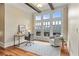 Bright home office with large windows, hardwood floors, and stylish furnishings at 1832 Gordon Ne Mnr, Atlanta, GA 30307