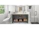 Bathroom with double vanity, a shower and white subway tiles at 45 Michelle Ne Cir, Atlanta, GA 30342
