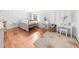 Charming bedroom featuring light hardwood floors and a make up vanity at 45 Michelle Ne Cir, Atlanta, GA 30342