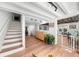 Open foyer with hardwood floors, stairs, and an abundance of light at 45 Michelle Ne Cir, Atlanta, GA 30342