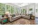 Bright living room with multiple windows, coffered ceiling, and cozy seating at 45 Michelle Ne Cir, Atlanta, GA 30342