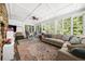 Bright living room with multiple windows and cozy seating at 45 Michelle Ne Cir, Atlanta, GA 30342