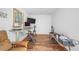 Bright office space with modern adjustable desk, wood flooring, and natural light at 45 Michelle Ne Cir, Atlanta, GA 30342