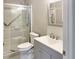Bathroom features a shower with sliding glass doors, plus a sink and vanity at 475 Mount Vernon Ne Hwy # 129C, Atlanta, GA 30328