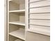 Bright, white linen closet features multiple shelves, perfect for storage and organization at 475 Mount Vernon Ne Hwy # 129C, Atlanta, GA 30328