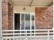 This covered patio features a glass sliding door to the inside of the apartment at 475 Mount Vernon Ne Hwy # 129C, Atlanta, GA 30328