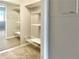 A spacious walk-in closet with plenty of shelving and a full-length mirror to expand the space at 475 Mount Vernon Ne Hwy # 129C, Atlanta, GA 30328
