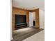 Finished basement features wood accent wall and access to the bathroom at 6906 Park Ave, Atlanta, GA 30342