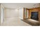 Finished basement with tile flooring, wood accent wall, and access to the backyard at 6906 Park Ave, Atlanta, GA 30342