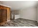 Bright and open living area featuring neutral paint, hardwood style flooring, and custom shelving at 6906 Park Ave, Atlanta, GA 30342