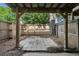 The open patio features a stone tiled floor and is surrounded by a wood fence at 6906 Park Ave, Atlanta, GA 30342