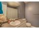 Well-lit bathroom with vanity, mirror and decorative accents at 75 Puppy Chase, Social Circle, GA 30025