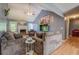 Comfortable living room with vaulted ceiling, fireplace, plush seating and hardwood floors at 75 Puppy Chase, Social Circle, GA 30025