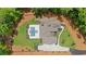 Overhead view of an estate showcasing a pool, landscaped grounds, and an elegant driveway at 1084 Wrights Mill Rd, Canton, GA 30115