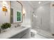 Modern bathroom with a marble shower, stylish vanity, and elegant fixtures, creating a luxurious spa-like retreat at 1084 Wrights Mill Rd, Canton, GA 30115